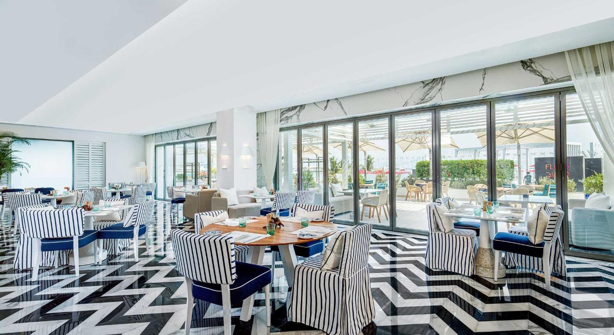 Th8 Palm Dubai Beach Resort, Vignette Collection By Ihg Екстериор снимка Restaurant